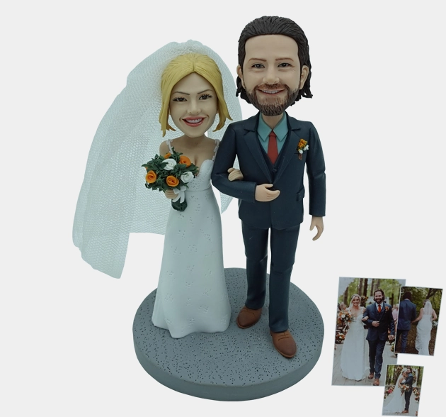Custom clay wedding figurines of bride and groom based on real wedding photo
